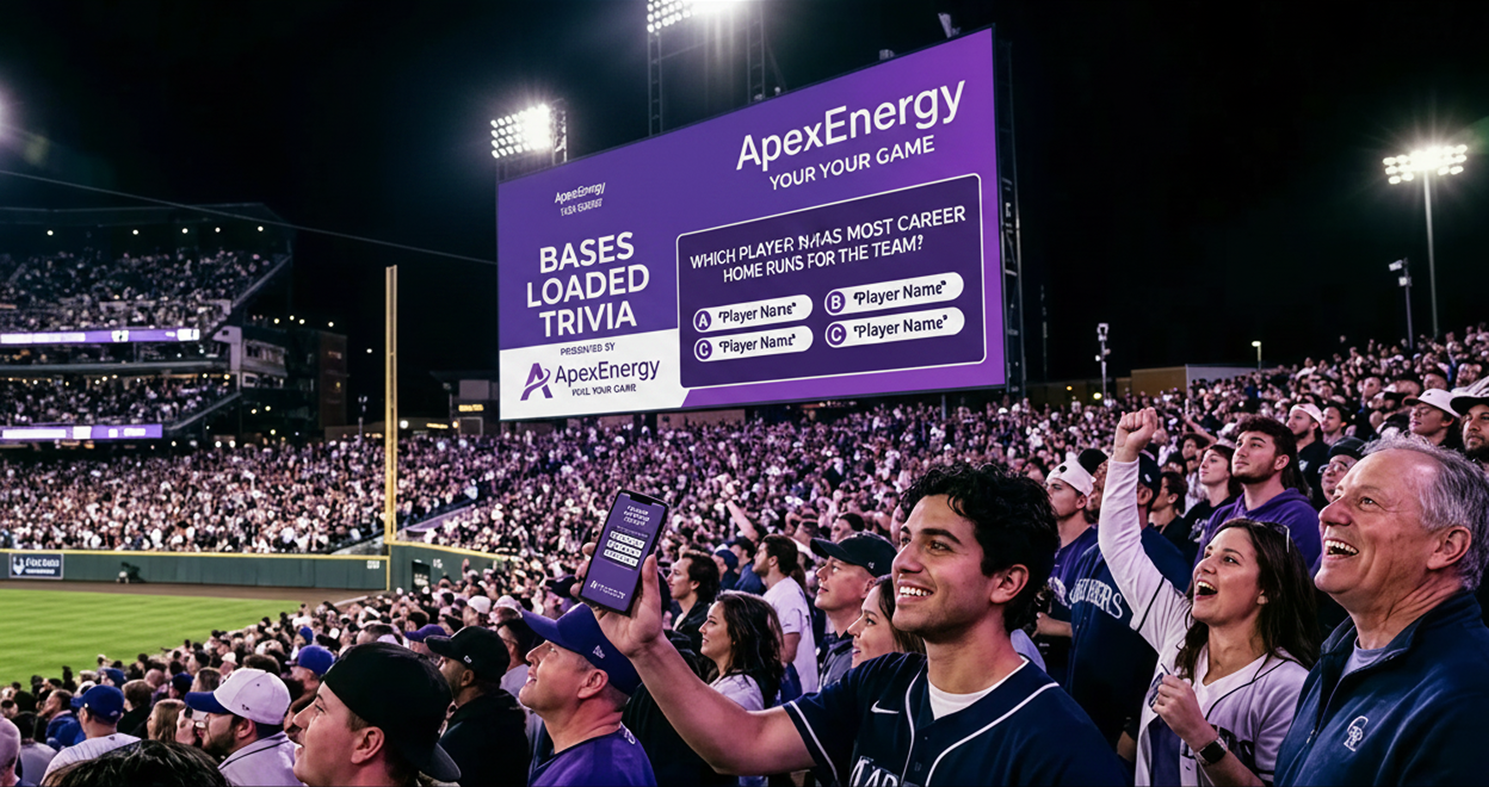 A low-angle shot of a massive videoboard in a packed baseball stadium at night. The screen displays an interactive trivia game titled 